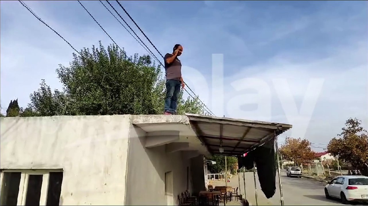 TELEFON ANCAK ÇATIDA ÇEKİYOR