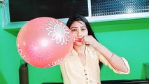 beautiful balloons with flowers prints and red love heart balloon blowing/royal khushi