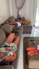 Pup Joins Parents For Nap on Couch