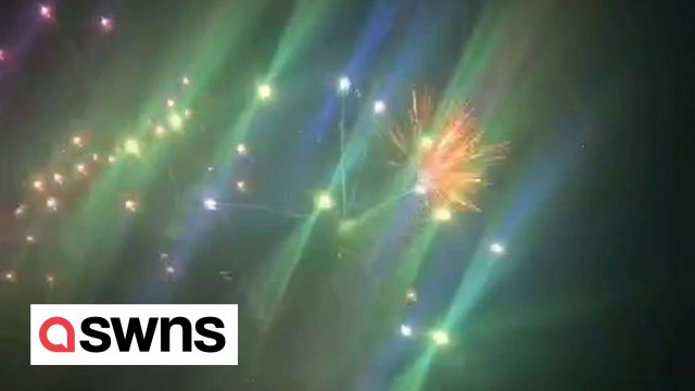Horrifying moment fireworks exploded in a crowd injuring several people