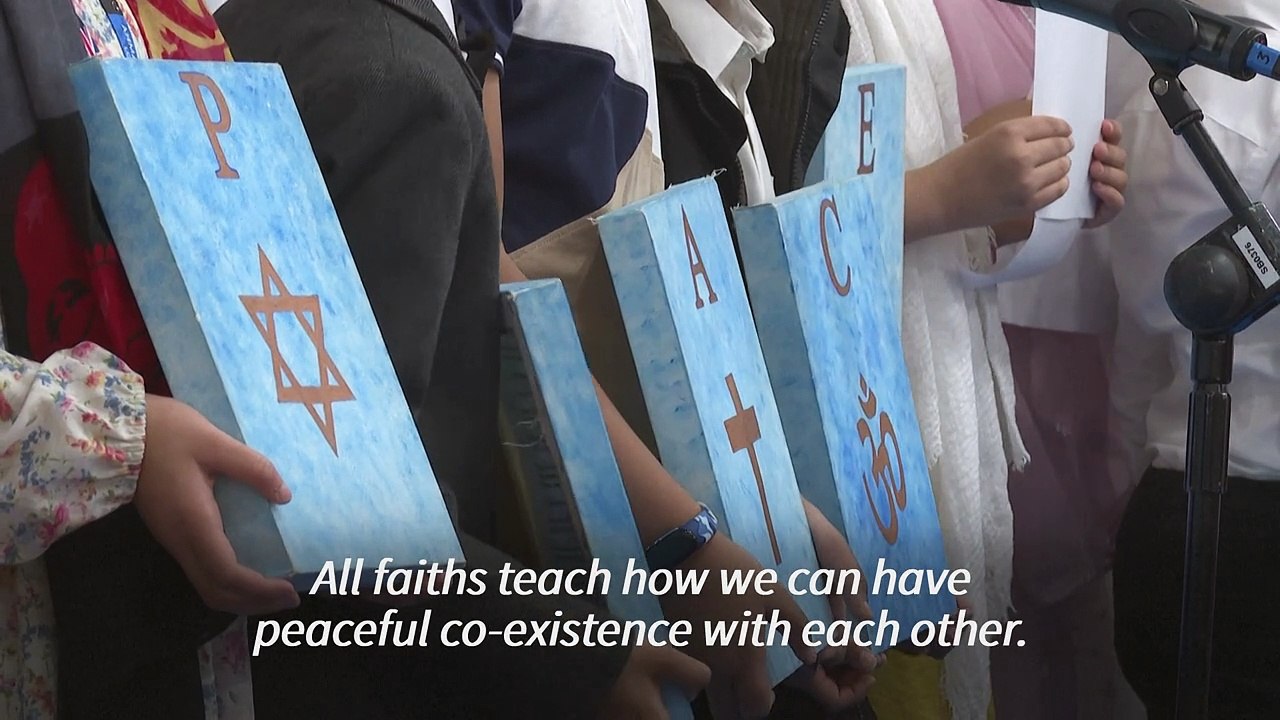 Jews, Muslims and Christians pray for peace at Britain's biggest mosque