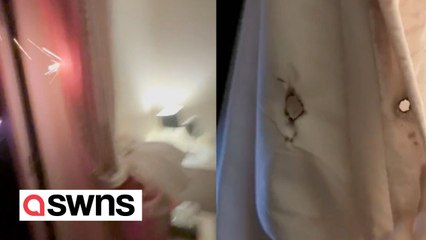 Woman had a close call after firework shot into her home - setting her curtains on fire