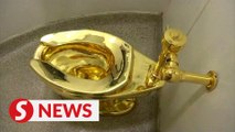 Four men charged over theft of US$6 million golden toilet