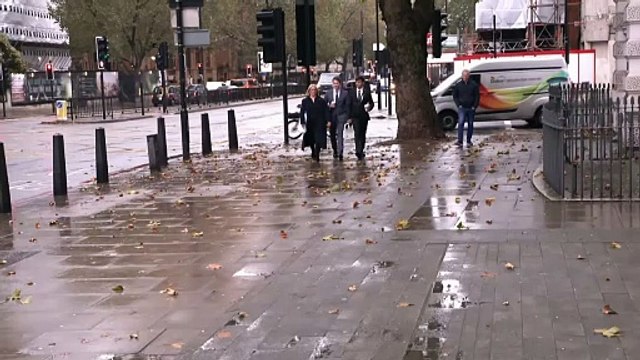 Dustin Lance Black and husband Tom Daley arrive at court