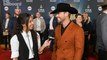 Dustin Lynch Reveals The Secret To Writing A No. 1 Hit, Talks Playing Beer Pong With Post Malone & More | CMA Awards 2023