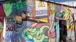 Artistas urbanos realizan mural en honor a los oficios del barrio La Penal en Guadalajara