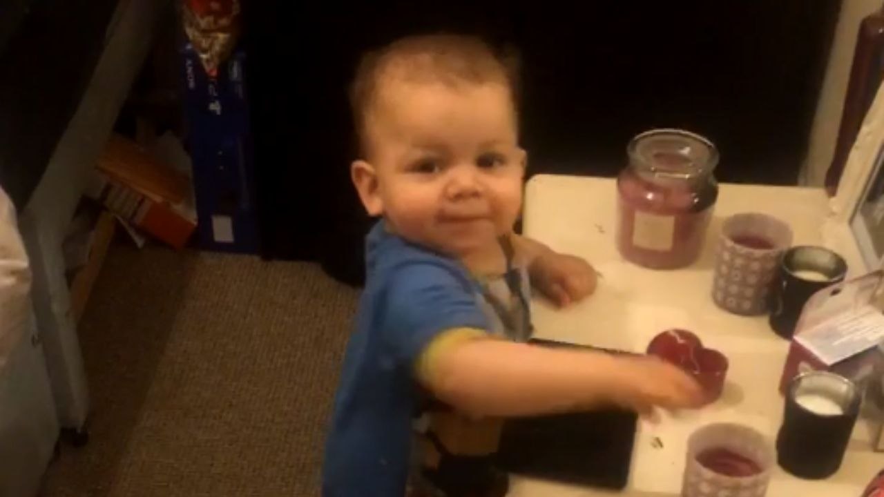 Mischievous toddler caught red-handed trying to turn sister's room into chaos