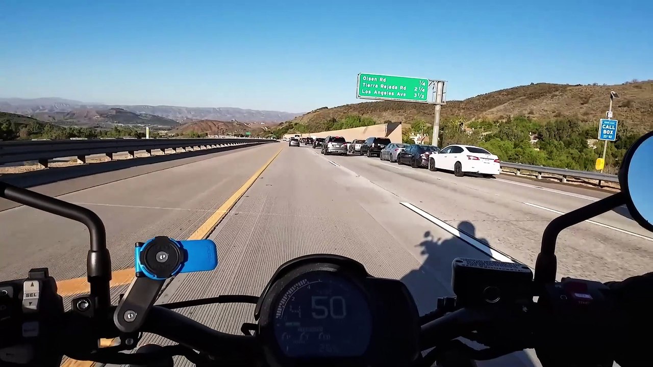 Driver Rear Ends Vehicle at Backed-Up Off-Ramp