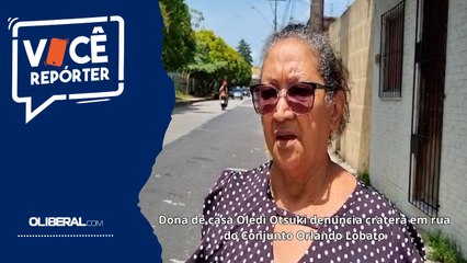 Dona de casa Oledi Otsuki denuncia cratera em rua do Conjunto Orlando Lobato