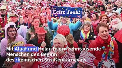 Narren und Jecken am Rhein feiern Karnevalsauftakt