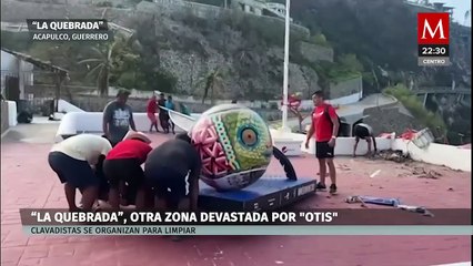 Los clavadistas se aferran al mar, y confían en el regreso de los turistas en La Quebrada