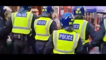 WARNING: Scuffles broke out between marchers and London Metropolitan Police