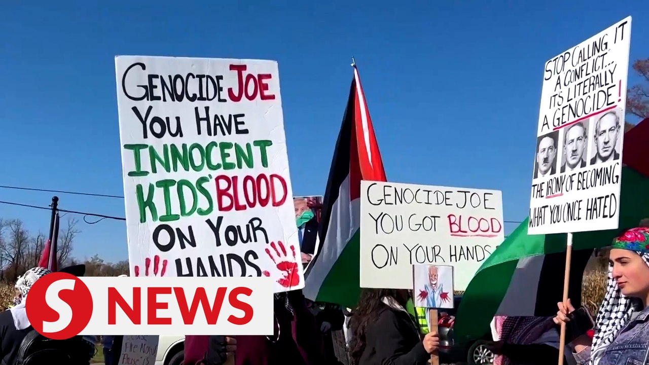 Pro-Palestinian demonstrators gather near Biden...