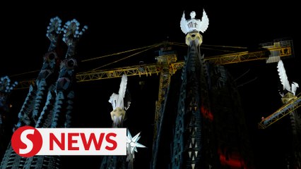 Barcelona's Sagrada Familia lights up new towers
