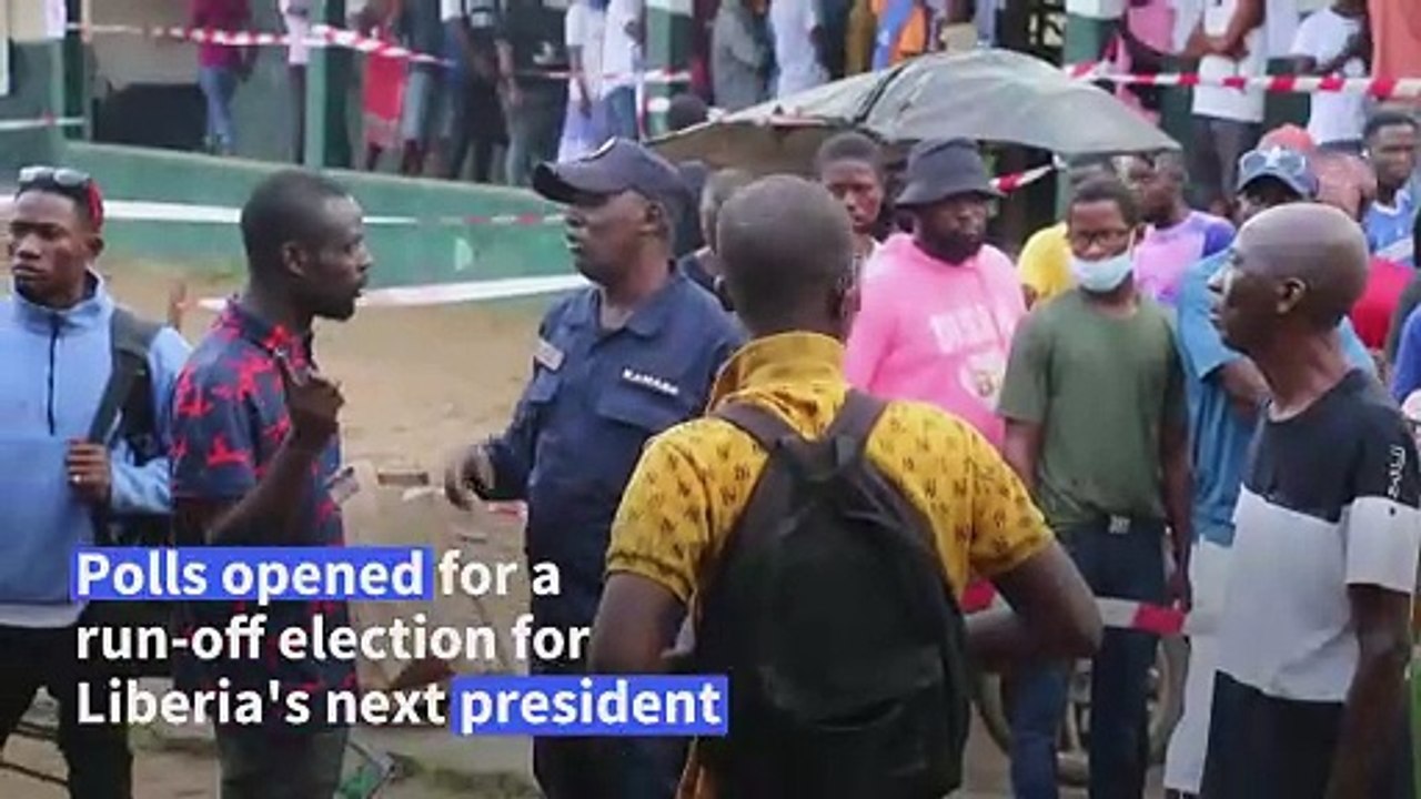 Liberians vote in presidential run-off between football legend and former Vice President