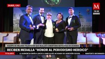 Equipo de MILENIO Televisión recibe medalla 