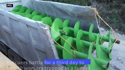 Indian rescuers battle for third day to free 40 trapped tunnel workers