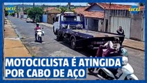 Motociclista bate em cabo de aço esticado no meio da rua