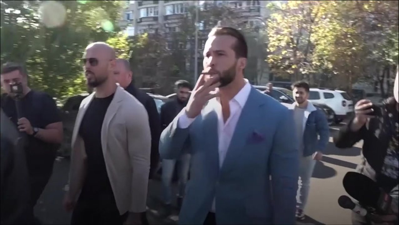 Andrew Tate arrives in court for preliminary hearing over human trafficking case