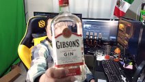 Abriendo una botella de ginebra gibson's para beber en la oficina con agua mineral de manantial y platicar con todos mis seguidores
