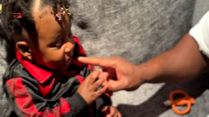 Toddler girl goes one on one with baby sibling for daddy's love *Hilarious*