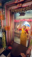 A woman performs the aarti of Maa Gadhkalika