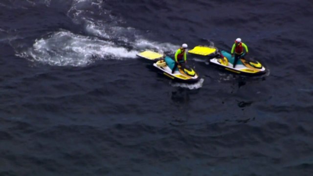Small jet crashes into Port Phillip Bay after midair collision near Victoria's Mornington Peninsula
