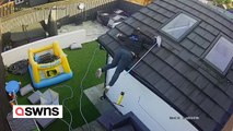 Hilarious footage captures moment dad falls off roof after trying to clean windows