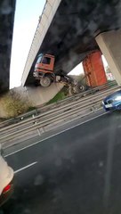 Truck Gets Stuck Under Overpass