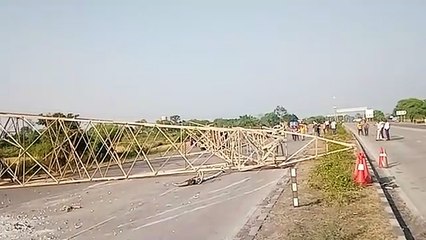 Tower falls on trailer