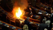 Albanian MPs set off flares to disrupt parliament budget vote