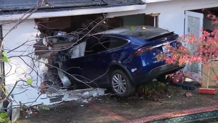Firefighters on scene after Tesla crashes into family’s kitchen in California