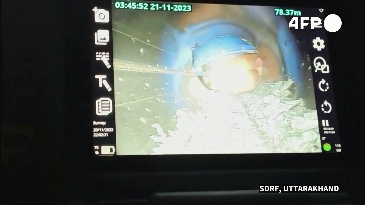 Indian workers trapped in tunnel for 10 days seen alive for first time on camera