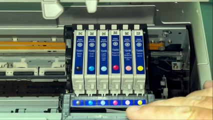 How to Replace the Ink Cartridges in an Epson Stylus Photo RX510 Printer