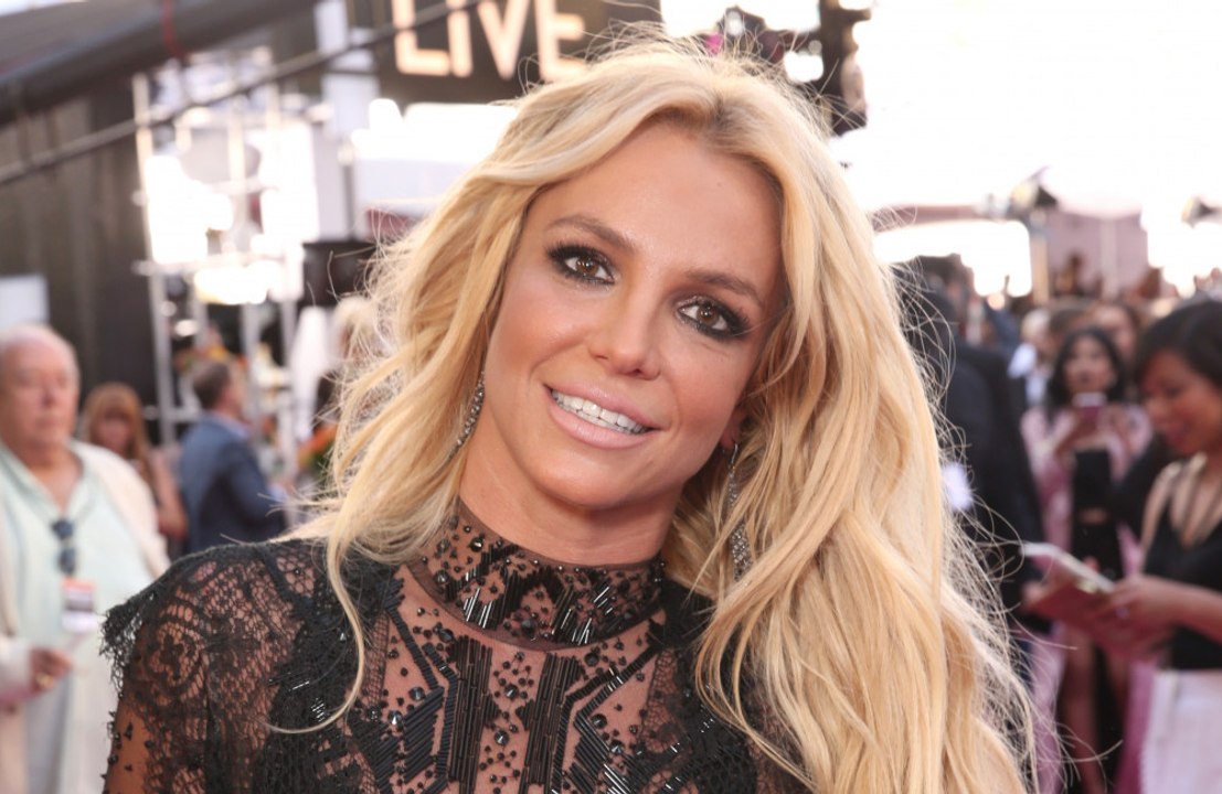 Britney Spears was in "really good spirits" when she went out to dinner with J Balvin and Maluma