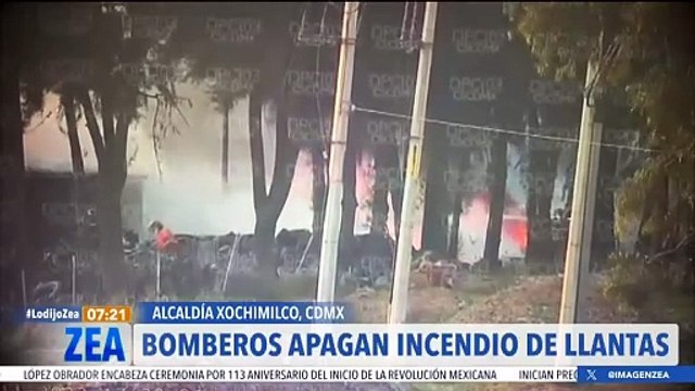 Bomberos sofocan incendio en un tiradero de llantas en Xochimilco