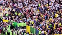 Police baton-charge Argentina fans at Maracana