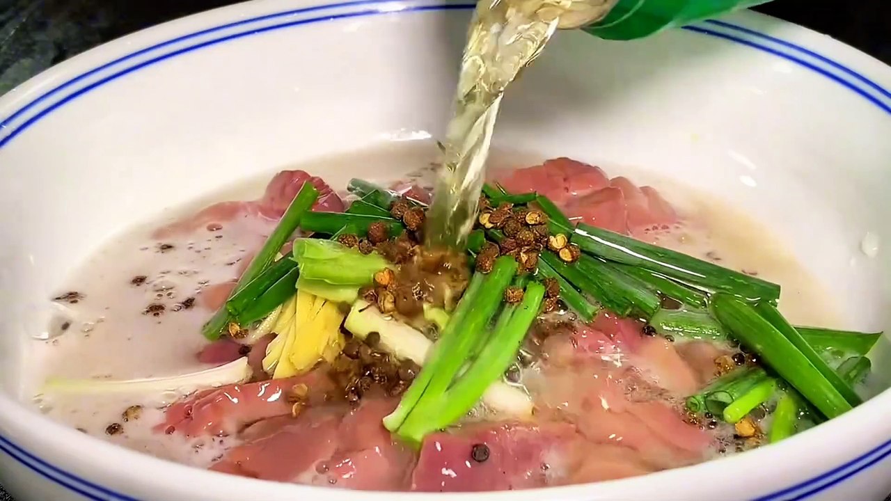 Chinese cuisine recipe,taught by the chef to stir fry cashews,served with wine and rice home cooking