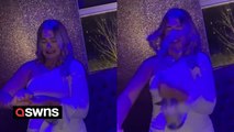 Funny moment teen pops bottle of prosecco - and soaks herself