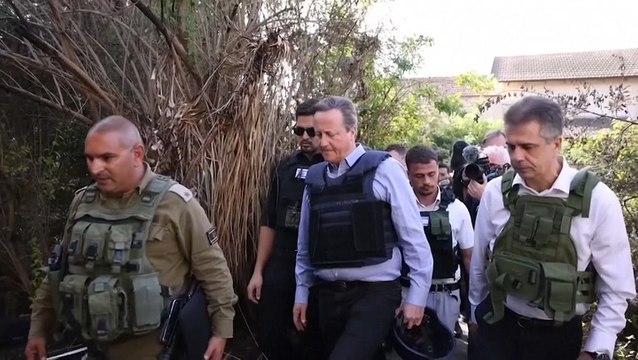David Cameron visits Israel as Hamas hostage release delayed