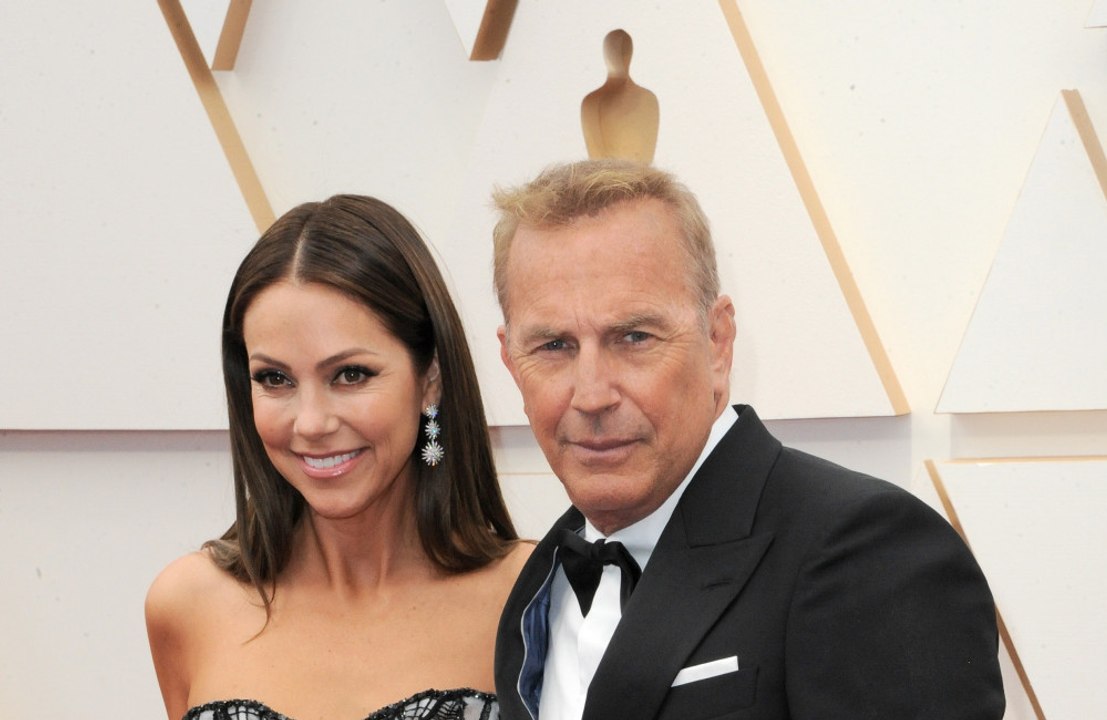 Kevin Costner is said to have partied on Sir Richard Branson’s island to recover from his brutal divorce battle