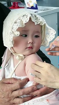 Adorable China baby cuddles on nurse reaction while injection_cute baby_crying_subscribe_viral_cu(360P)