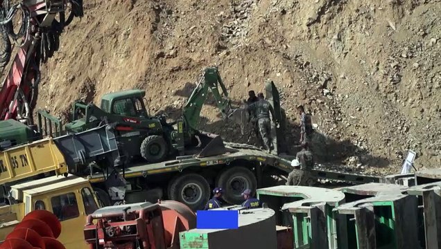 Indian rescuers dig vertical shaft into mountain to free 41 trapped workers