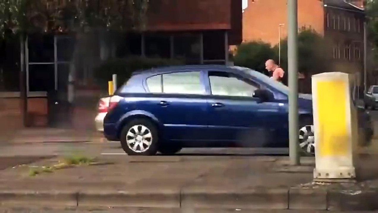 Road rage. Got so mad he jumped on a moving cars hood