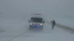 Ukrainian emergency workers tow ambulance from snow as storm kills at least five