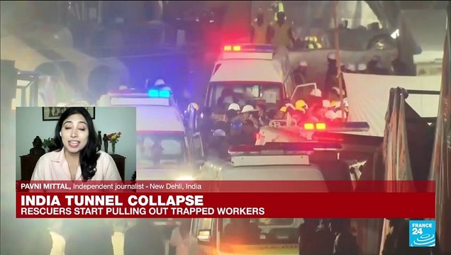 Indian rescuers reach workers trapped in collapsed tunnel