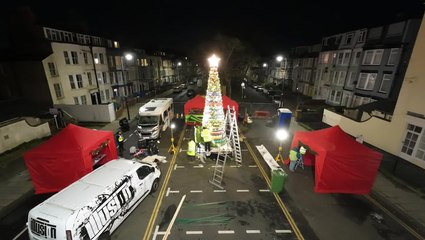 Christmas tree made up of 2,000 cans of food on display in Trafalgar Square