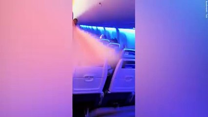 Download Video: Passenger opens Southwest Airlines plane's emergency exit and climbs on wing in New Orleans