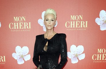 Brigitte Nielsen has warned women that waiting to have a baby 'can be very expensive'