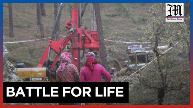 Indian rescuers dig vertical shaft into mountain to free 41 trapped workers